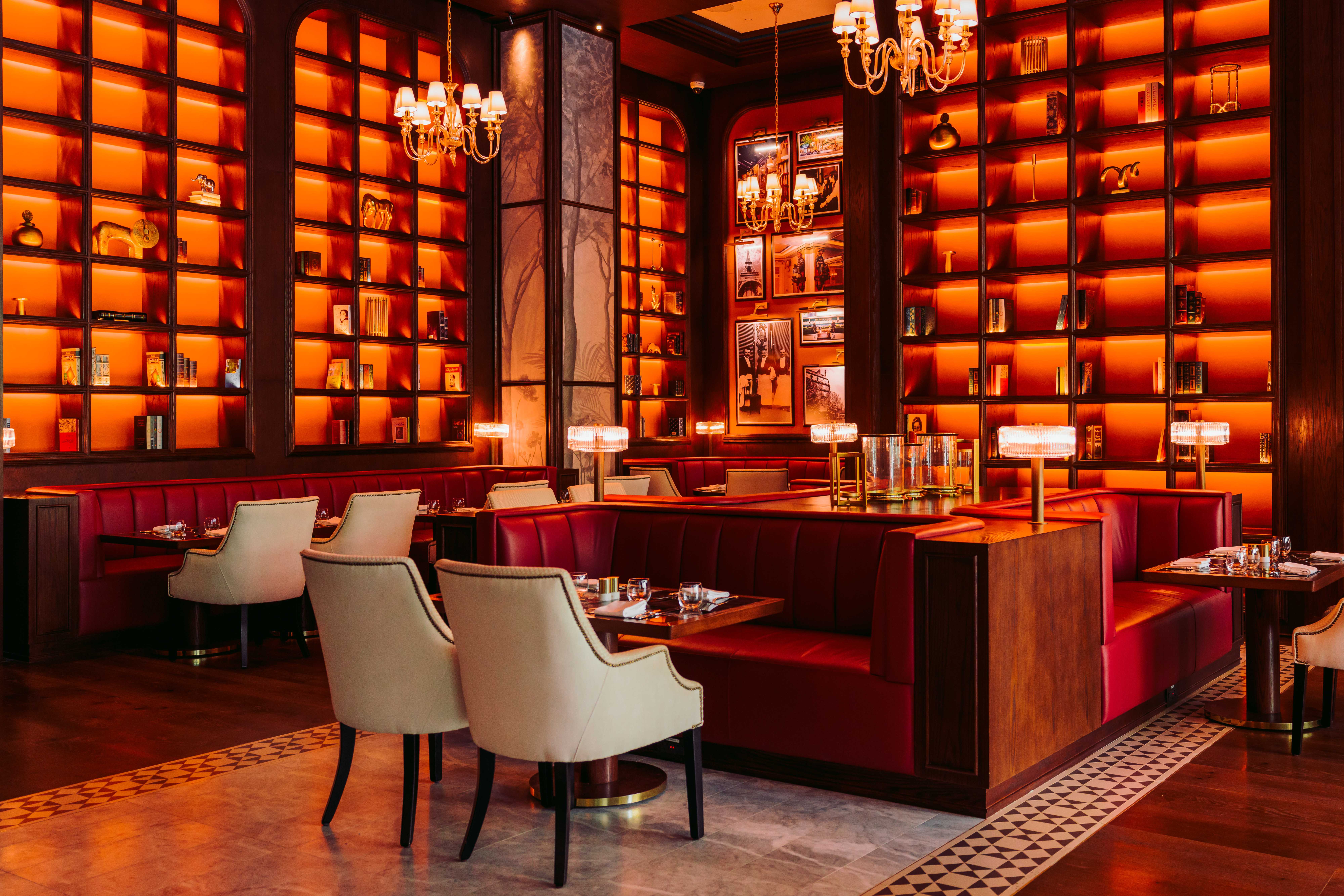 Modern restaurant interior with olive trees