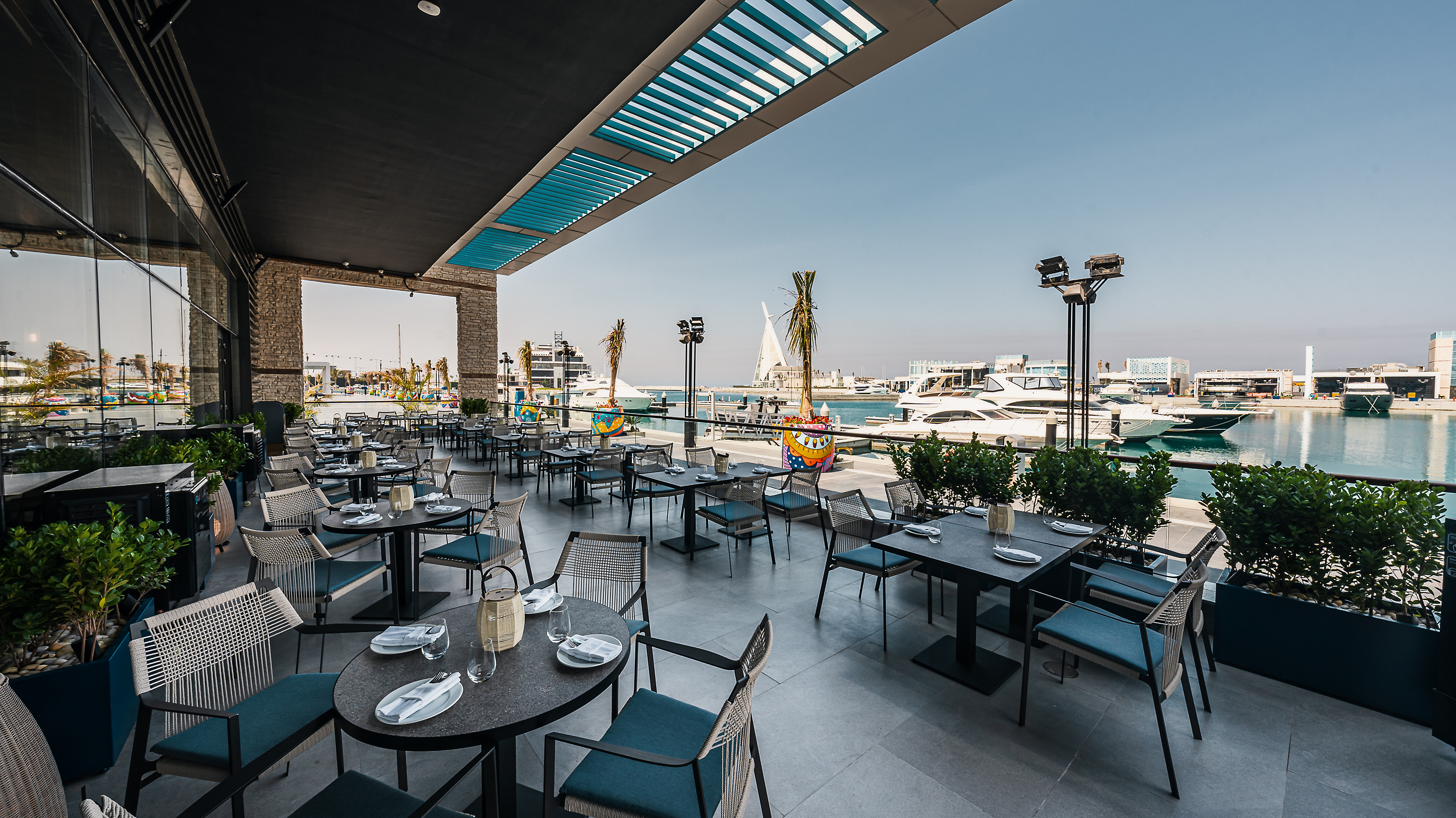 Luxury restaurant with dramatic orange backlit shelving